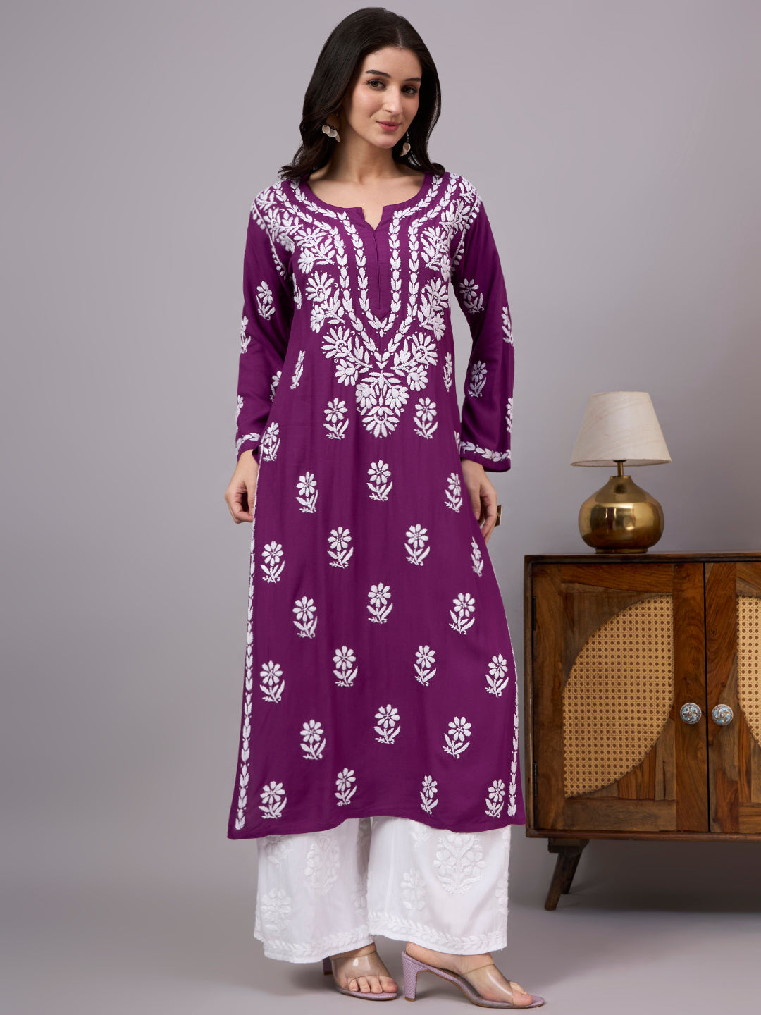 Comfortable regular wear Rayon Straight Kurti with authentic handcrafted Chikankari embroidery, traditional craftsmanship, and modern ethnic fashion suitable for every season.