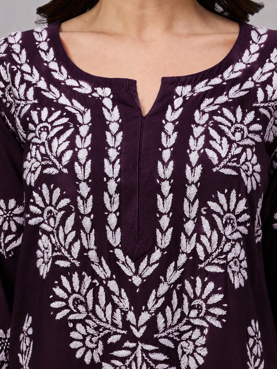 Women's trending kurti featuring authentic Lucknow Chikankari embroidery, soft rayon construction, straight silhouette, and versatile styling for every occasion.