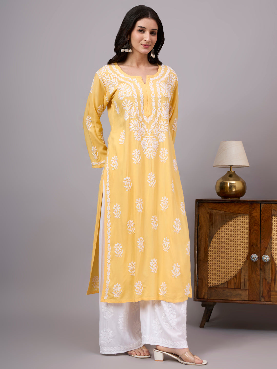 Hand-embroidered Chikankari Kurta designed with premium rayon fabric, straight silhouette, and timeless floral embroidery for modern women.