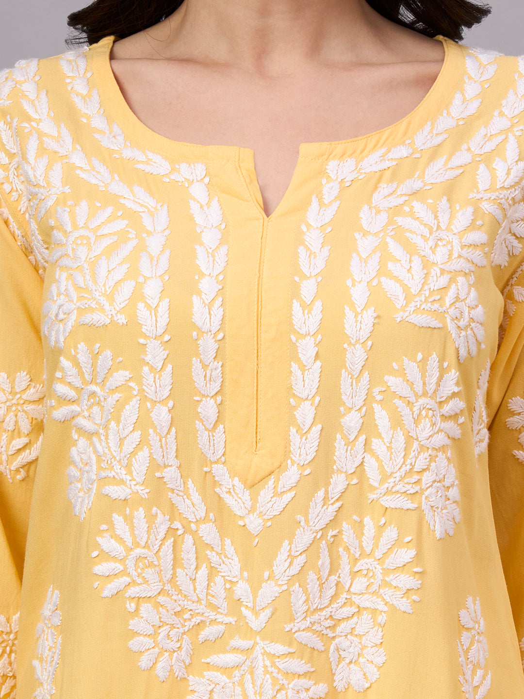 Traditional Rayon Straight Kurti with detailed handcrafted embroidery offering lightweight comfort, graceful styling, and versatile everyday wear.