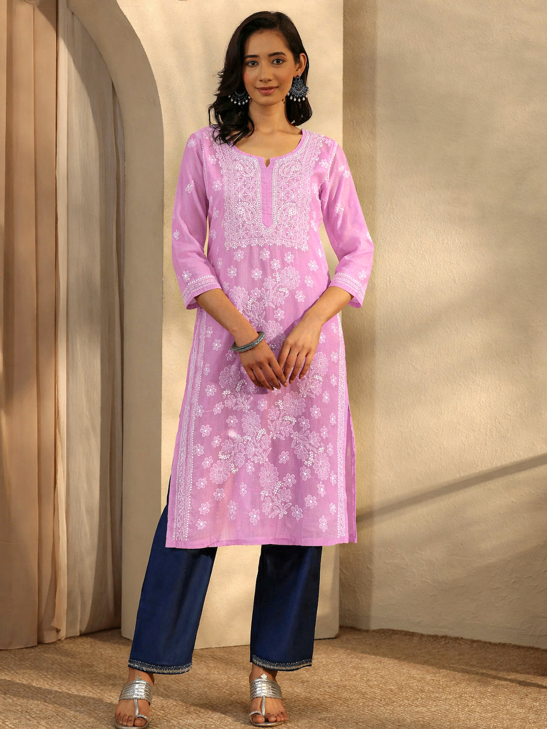 Elegant cotton straight kurti showcasing traditional chikankari work ideal for office wear and casual styling