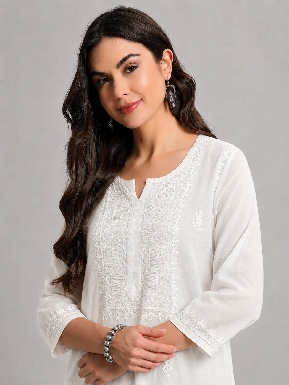 Beautiful Chikankari top crafted from lightweight Chanderi fabric with intricate floral embroidery work and comfortable everyday wear design