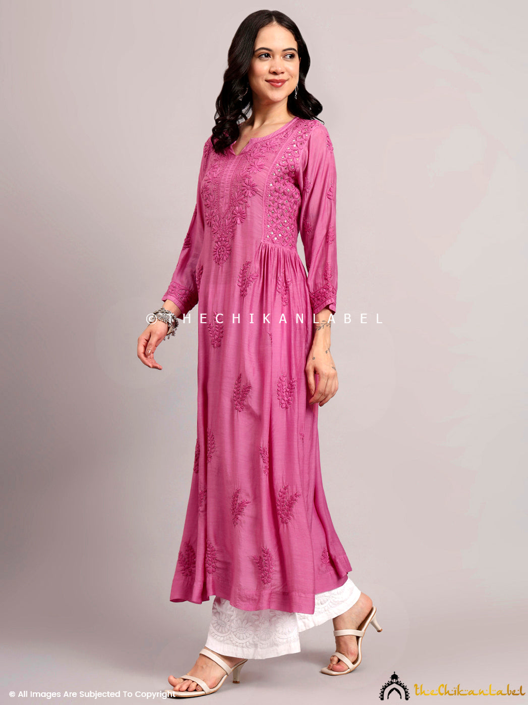 Fashion-forward look featuring traditional Lucknowi embroidery on muslin base.