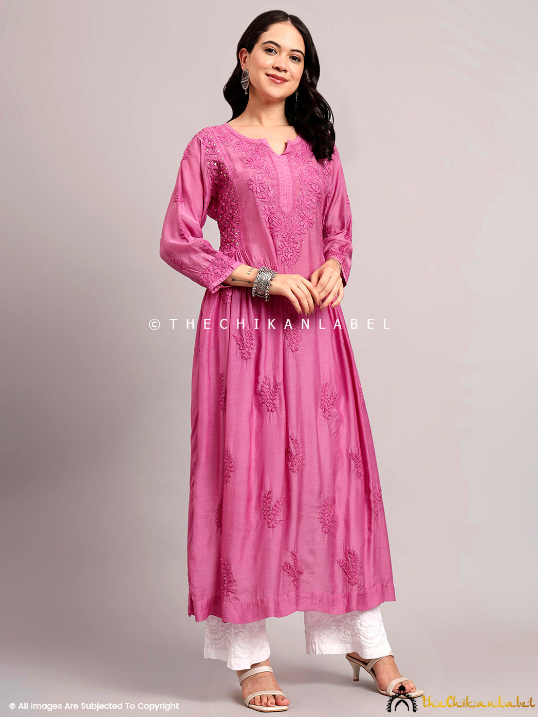 Ethnic wear photoshoot featuring artisan-crafted chikankari kurti styled with heels and accessories.