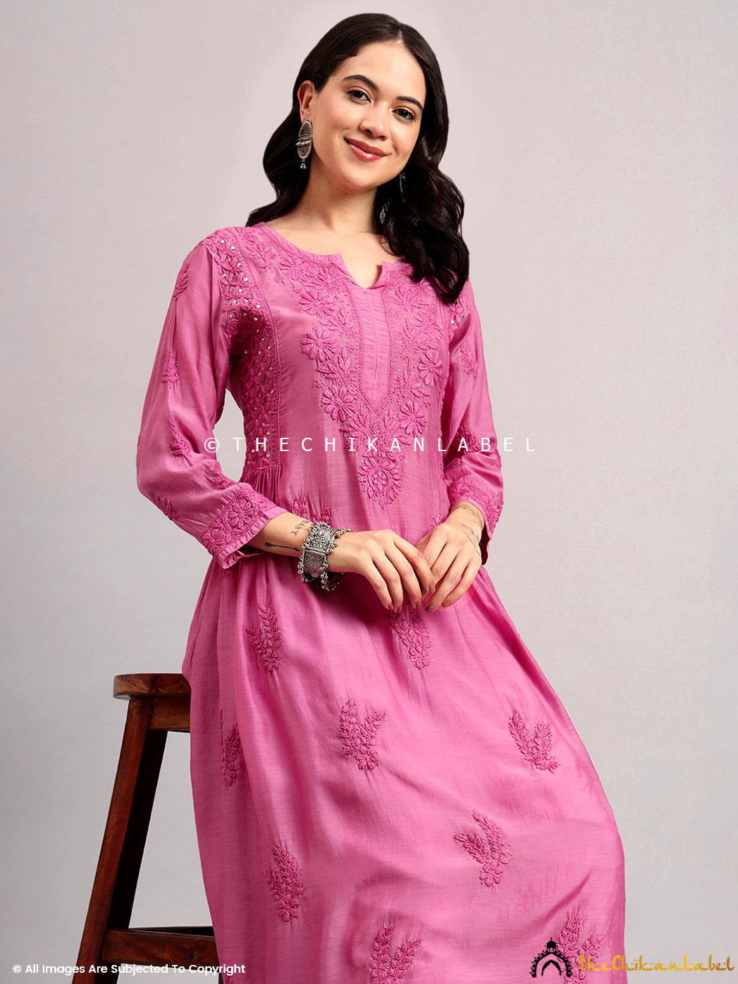 Indo-western ethnic wear look with handcrafted kurti and contrast embroidered pants.
