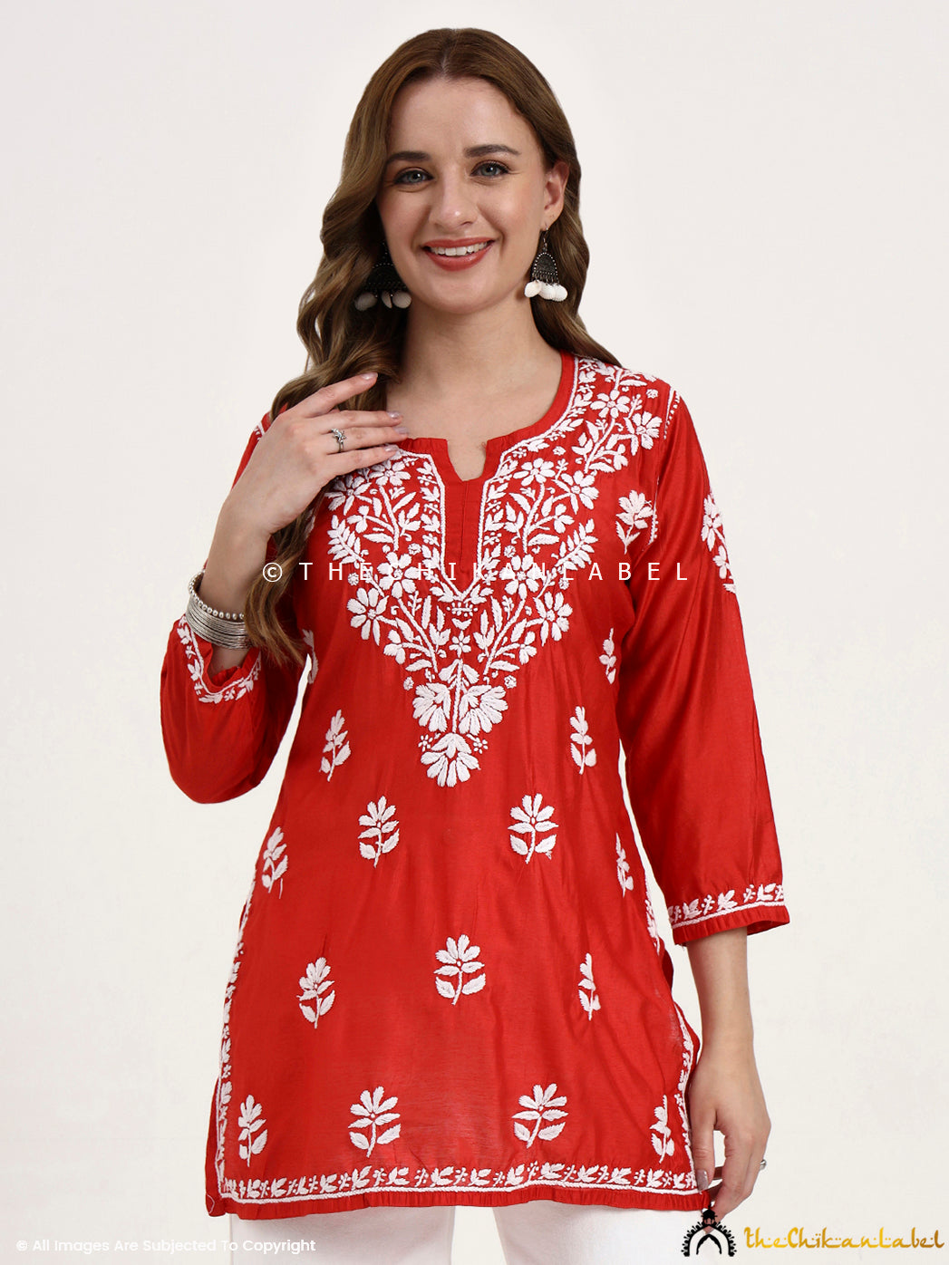 Handcrafted Chanderi chikankari short top with intricate floral embroidery for festive and casual wear.