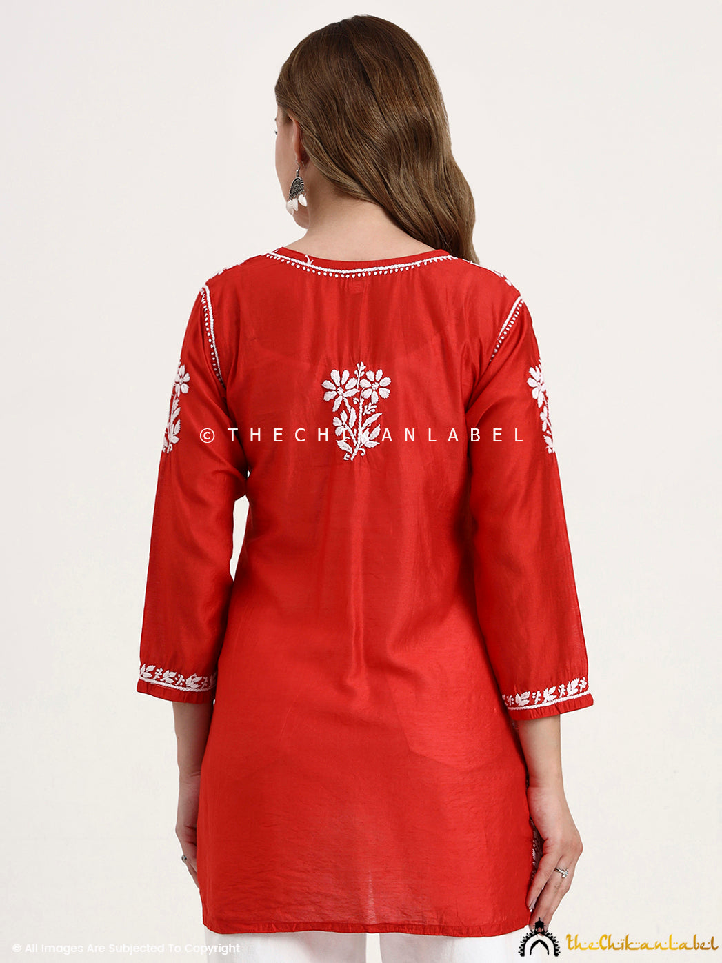 Lightweight Chanderi short top with delicate hand-embroidered chikankari motifs for women.