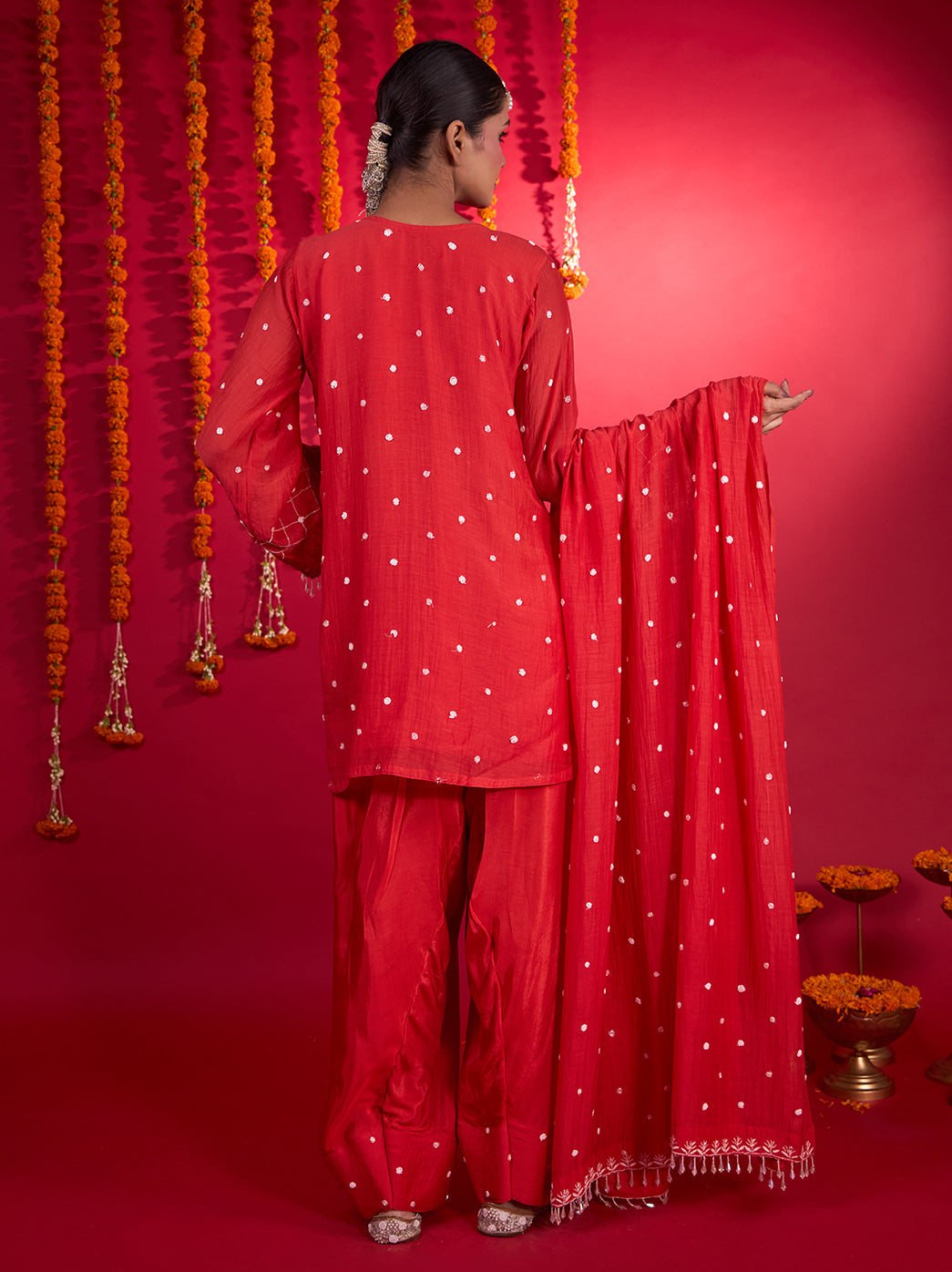 Front view of the Mehfil-e-Rang Mul Chanderi Kurta Set with Dupatta, showing its relaxed silhouette, embroidered cuffs and coordinated wide-leg bottoms.