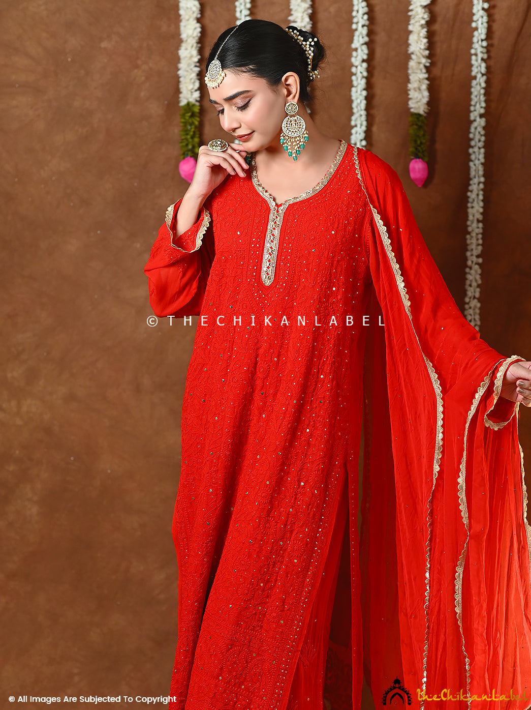 Hand-embroidered mukaish chikankari kurta sharara set perfect for festive occasions and weddings.