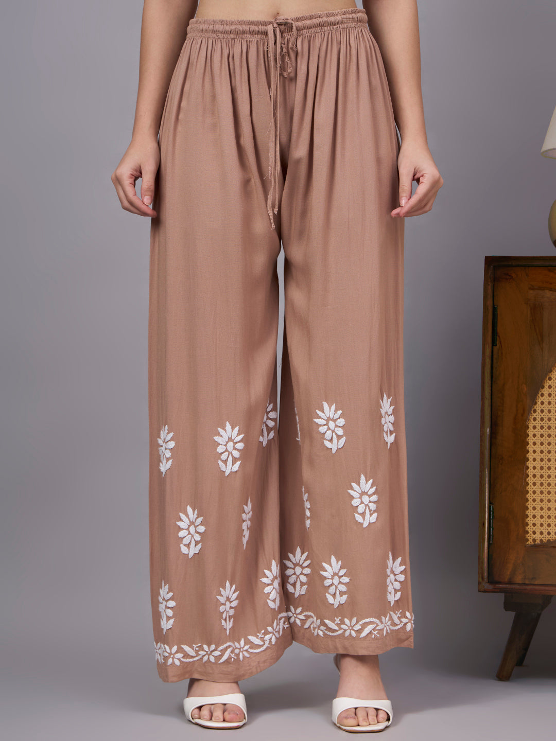 Premium trending kurta set made from breathable rayon fabric with handcrafted Chikankari embroidery, offering comfort, elegance, and timeless craftsmanship.