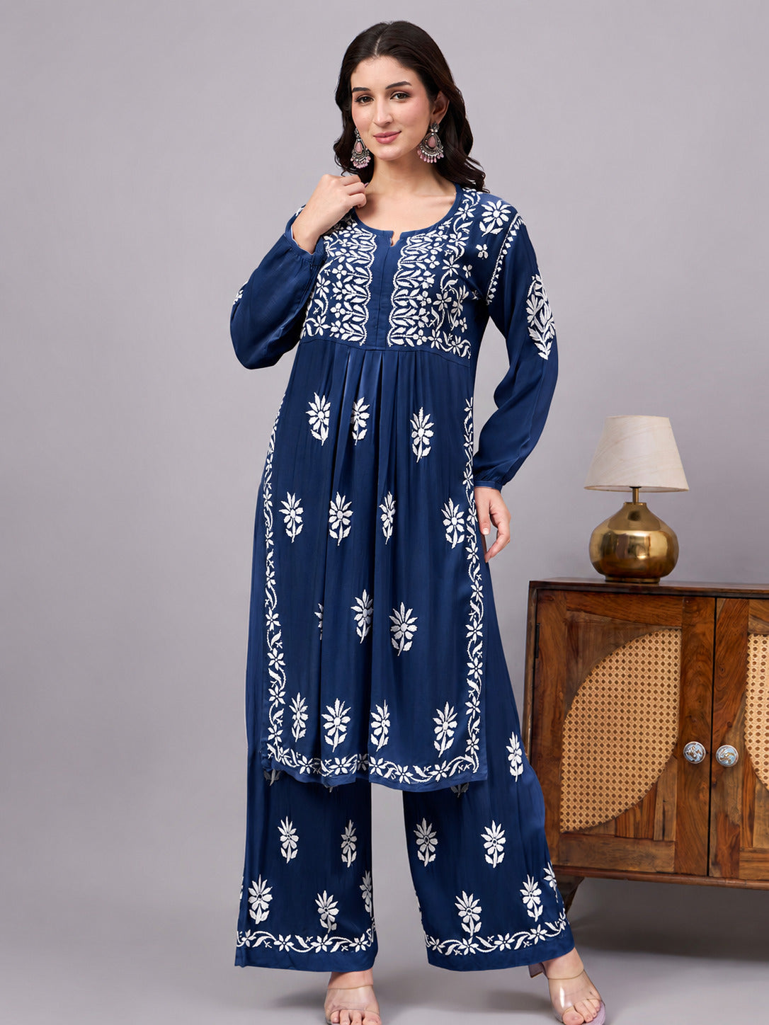 Premium Chikankari Set crafted from soft rayon fabric with intricate handcrafted embroidery, an elegant A-line silhouette, and coordinated palazzo for everyday ethnic fashion.