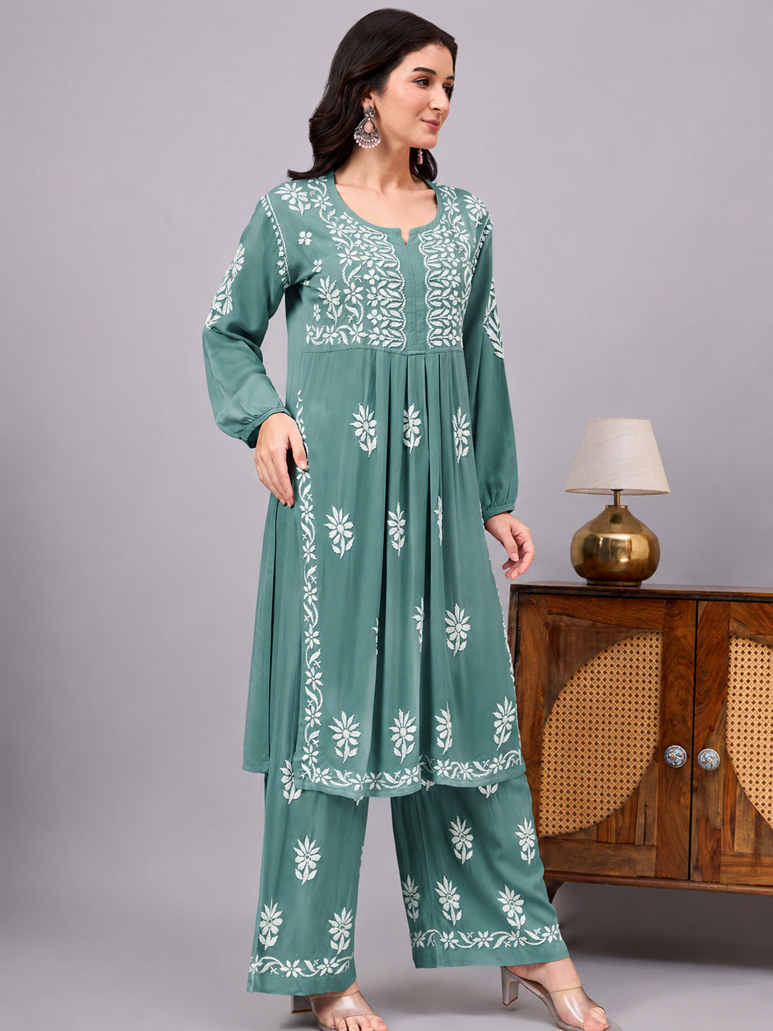 Elegant comfortable regular wear kurta palazzo set showcasing traditional Chikankari embroidery, premium rayon construction, and a graceful A-line design for modern women.