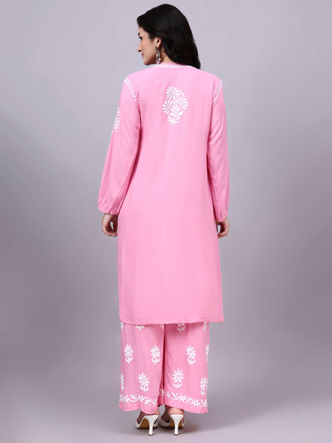 Women's comfortable regular wear kurta palazzo set with authentic handcrafted Chikankari embroidery, lightweight rayon fabric, and a flowing A-line silhouette.