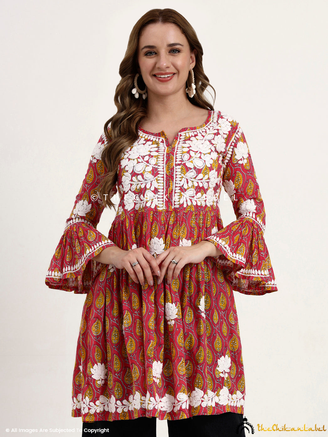 Pink Aamira Mulmul Printed Chikankari Peplum Top