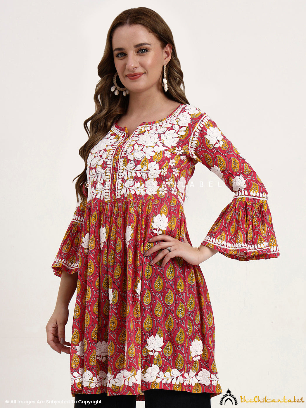 Pink Aamira Mulmul Printed Chikankari Peplum Top