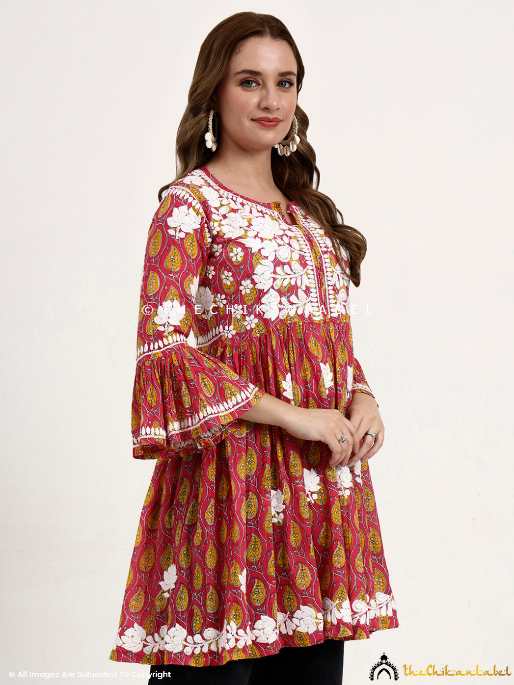 Pink Aamira Mulmul Printed Chikankari Peplum Top