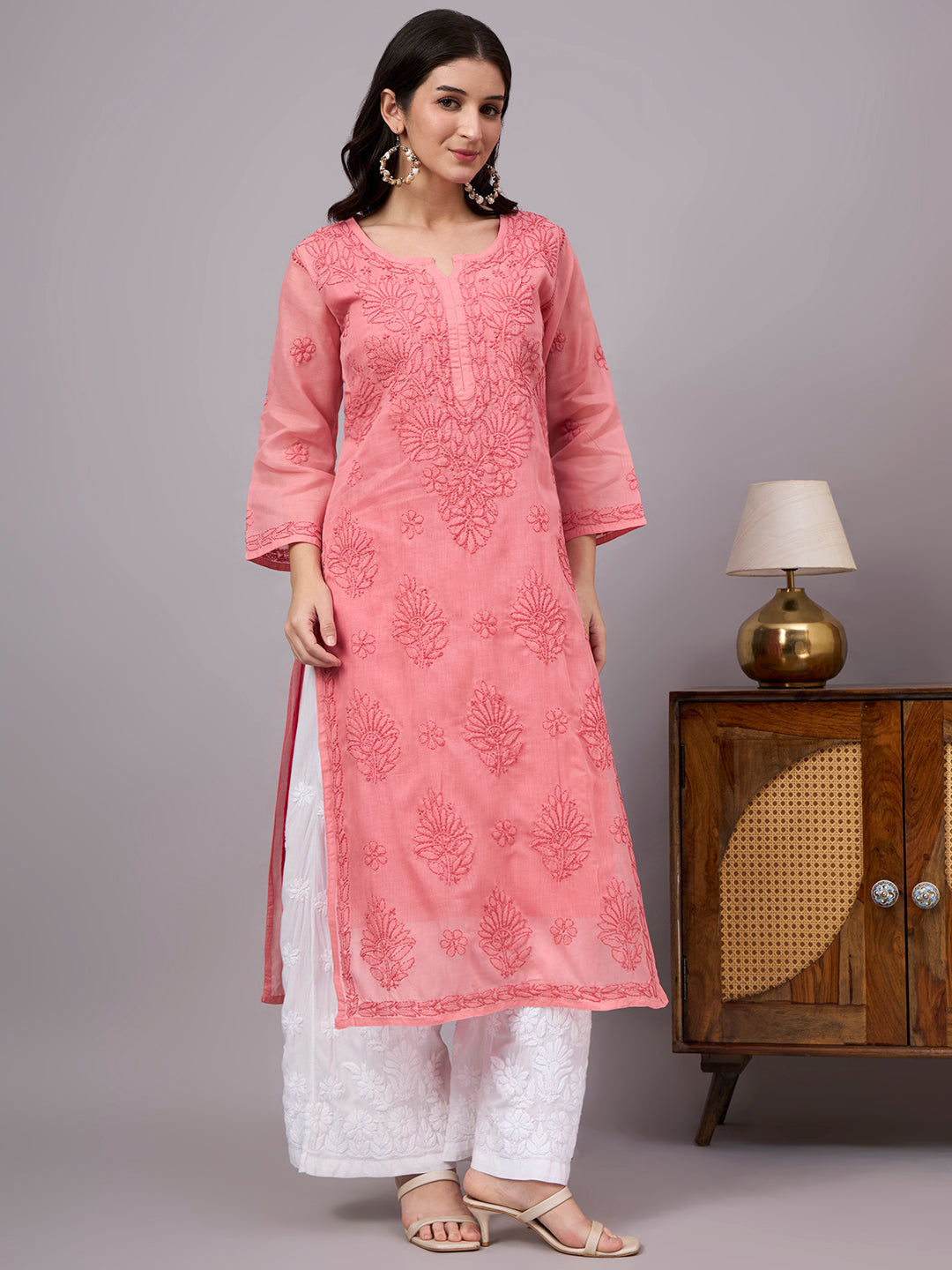 Premium Cotton kurta with inner featuring intricate handcrafted Chikankari embroidery, breathable cotton fabric, and a flattering straight silhouette for everyday elegance.