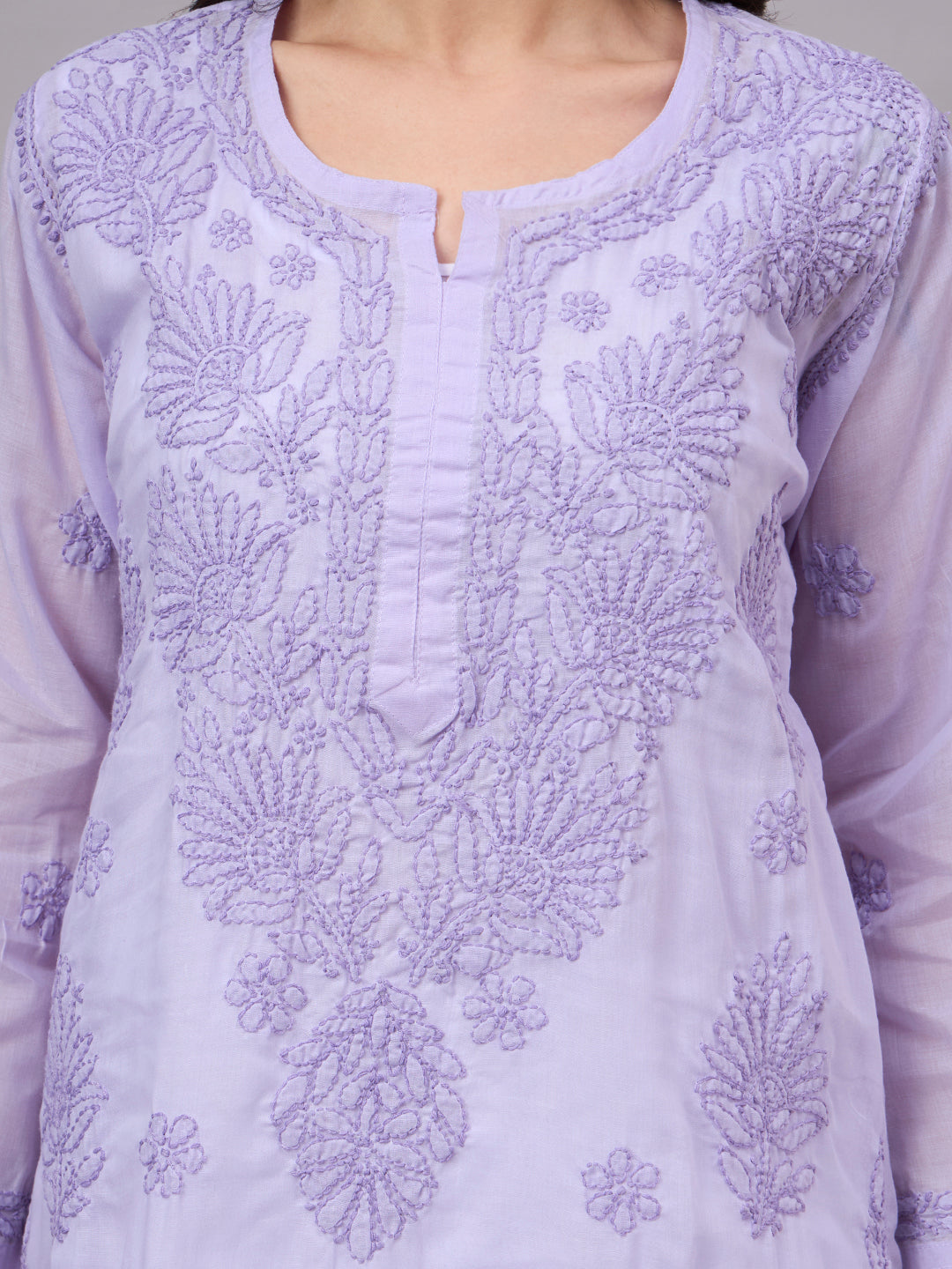 Authentic Cotton Straight Kurti designed with handcrafted floral Chikankari embroidery, breathable fabric, and an attached inner for all-day comfort.