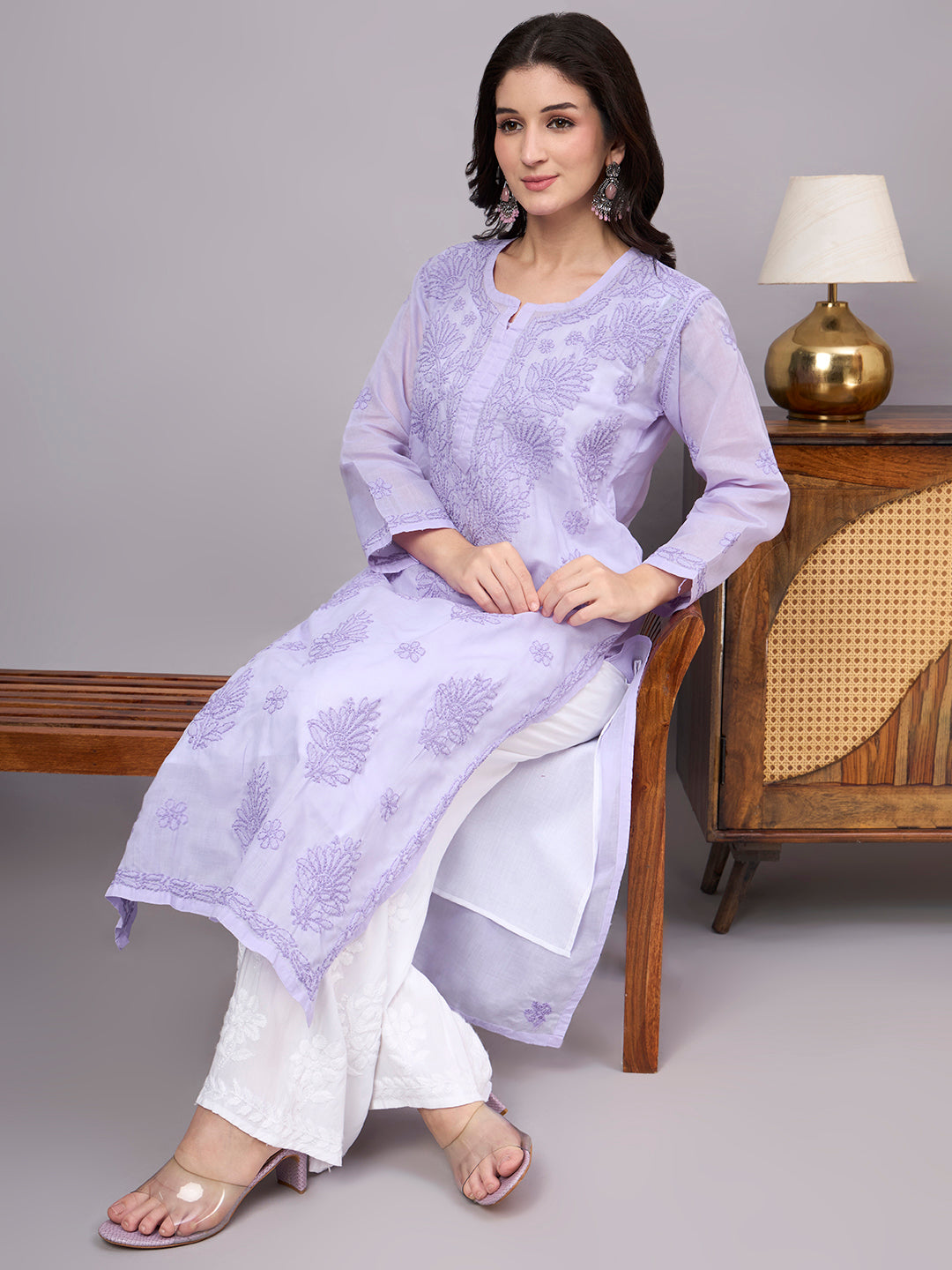 Women's handcrafted Chikankari Kurta made from breathable cotton fabric with detailed artisan embroidery and a comfortable regular fit for every occasion.