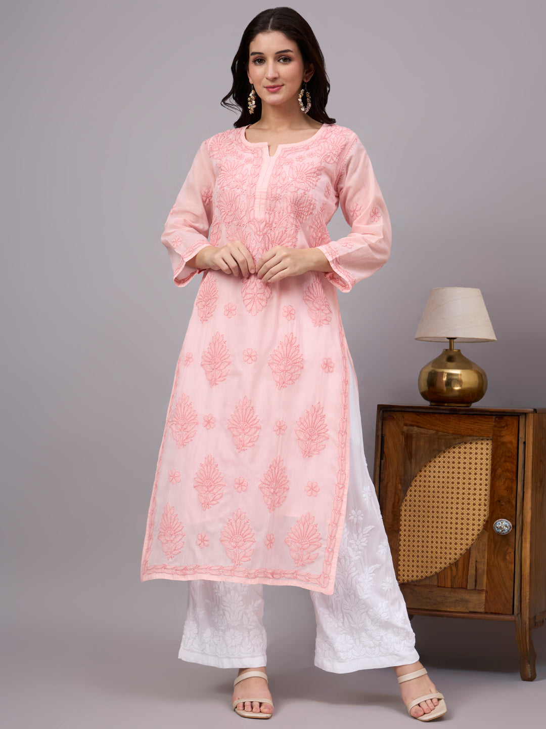 Elegant Chikankari Kurta crafted from premium cotton with a soft attached inner, showcasing traditional Lucknow embroidery for timeless ethnic fashion.