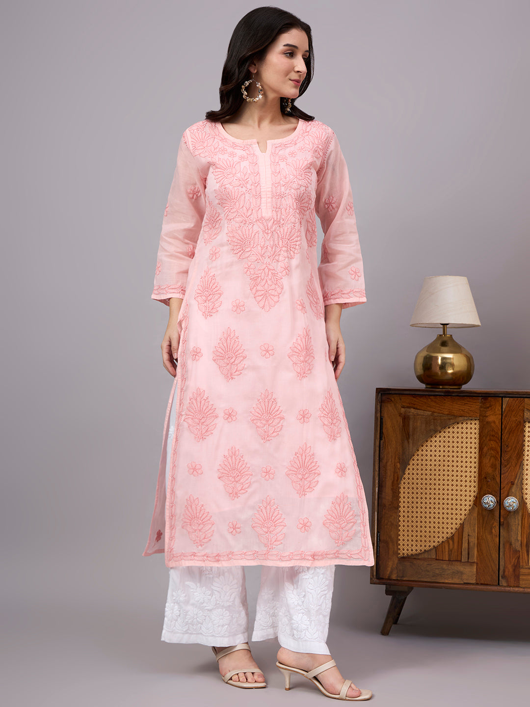 Comfortable regular wear Chikankari Kurta made from premium cotton fabric with handcrafted embroidery and an attached inner for enhanced comfort and coverage.