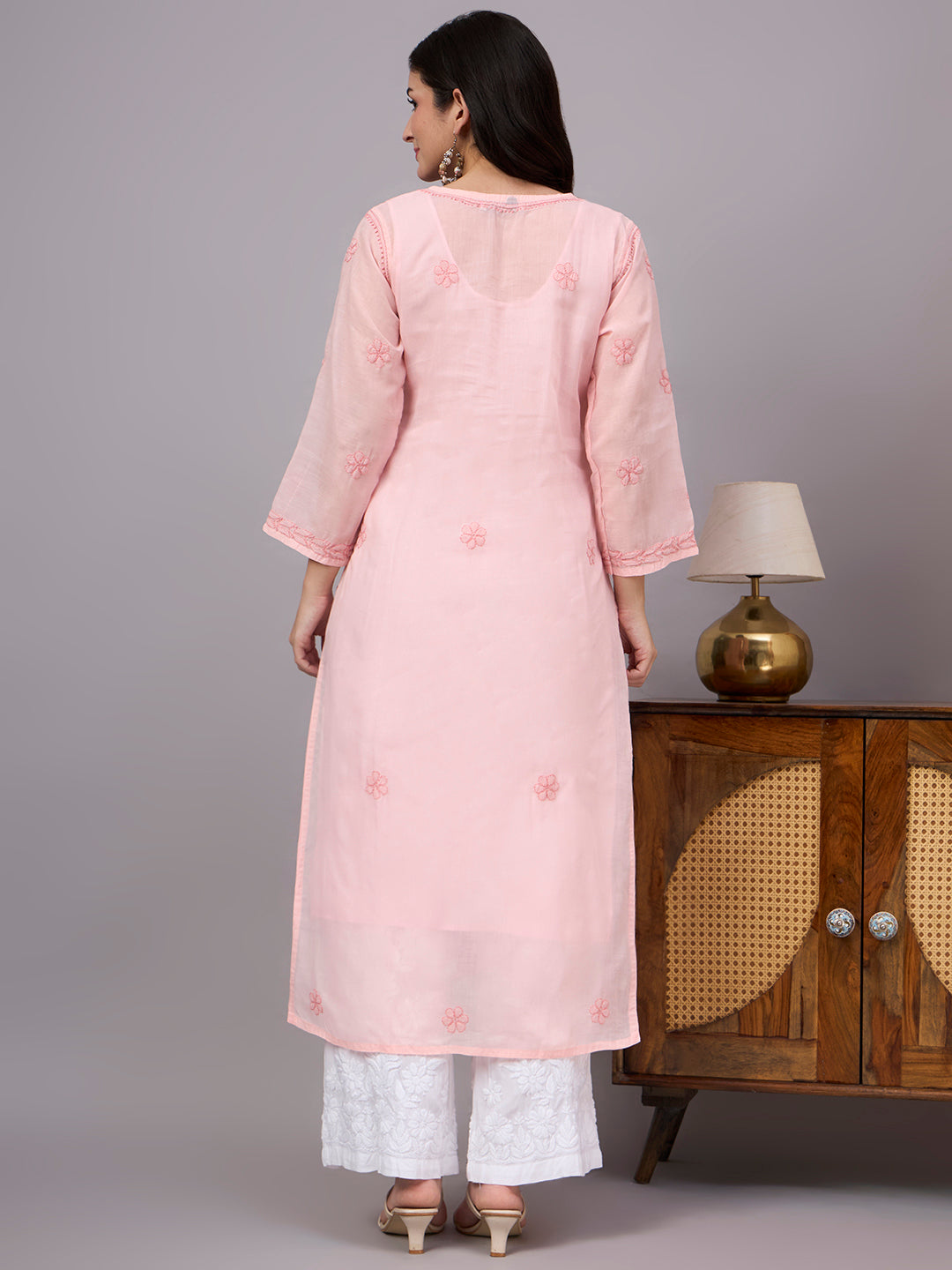 Premium Cotton kurta with inner featuring intricate handcrafted Chikankari embroidery, breathable cotton fabric, and a flattering straight silhouette for everyday elegance.