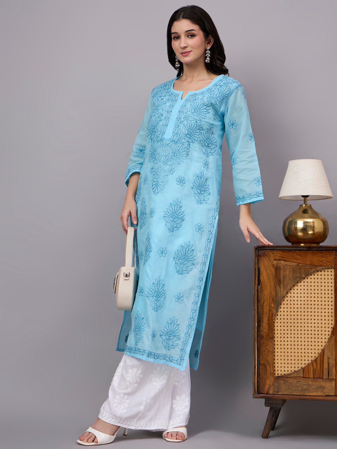 Traditional Cotton Straight Kurti featuring authentic handcrafted Chikankari work, soft cotton inner, and timeless ethnic elegance for women.
