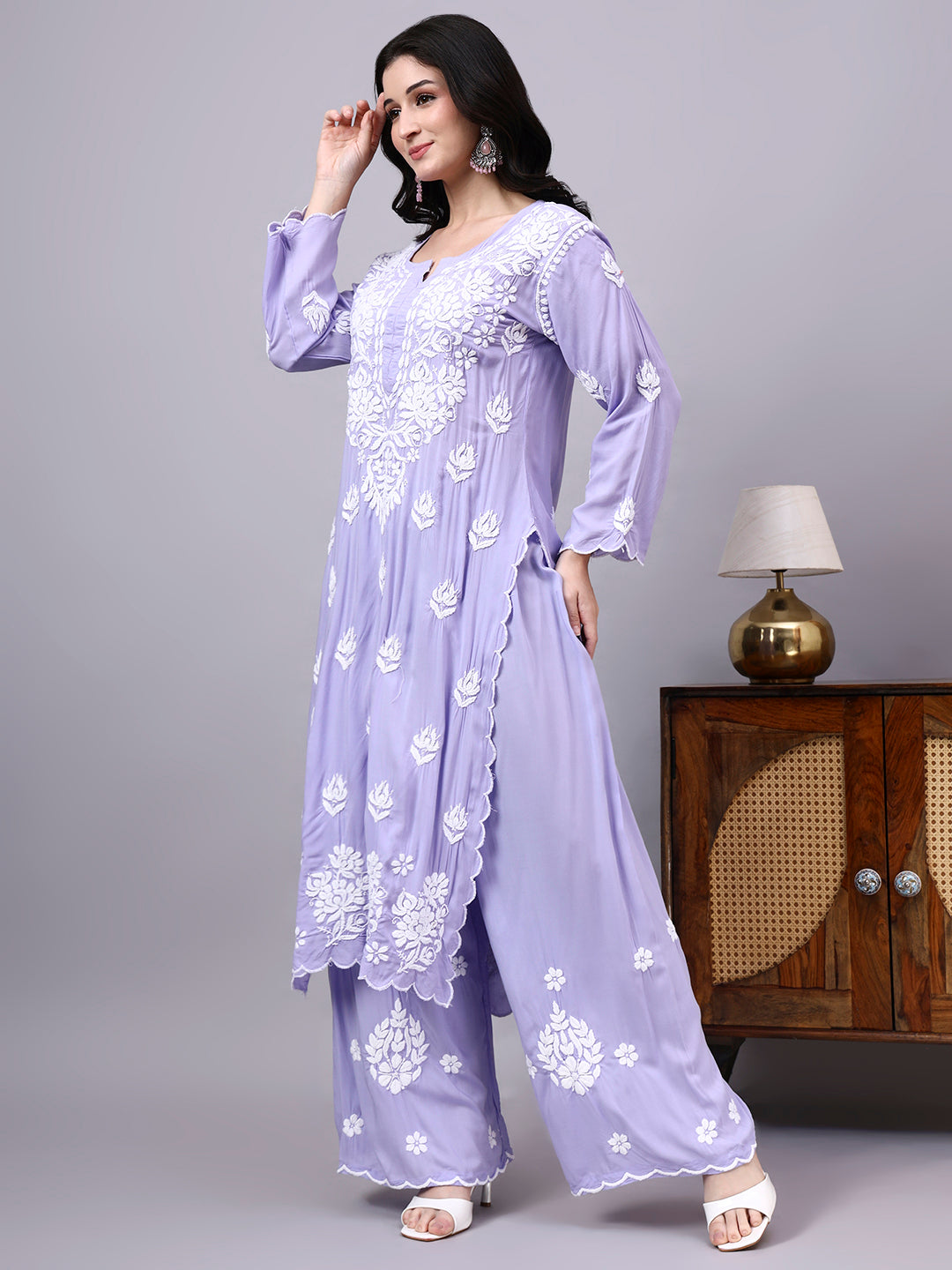 Women's handcrafted Modal Straight Kurti Palazzo Set featuring elegant Chikankari motifs, soft fabric texture, and versatile styling for multiple occasions.