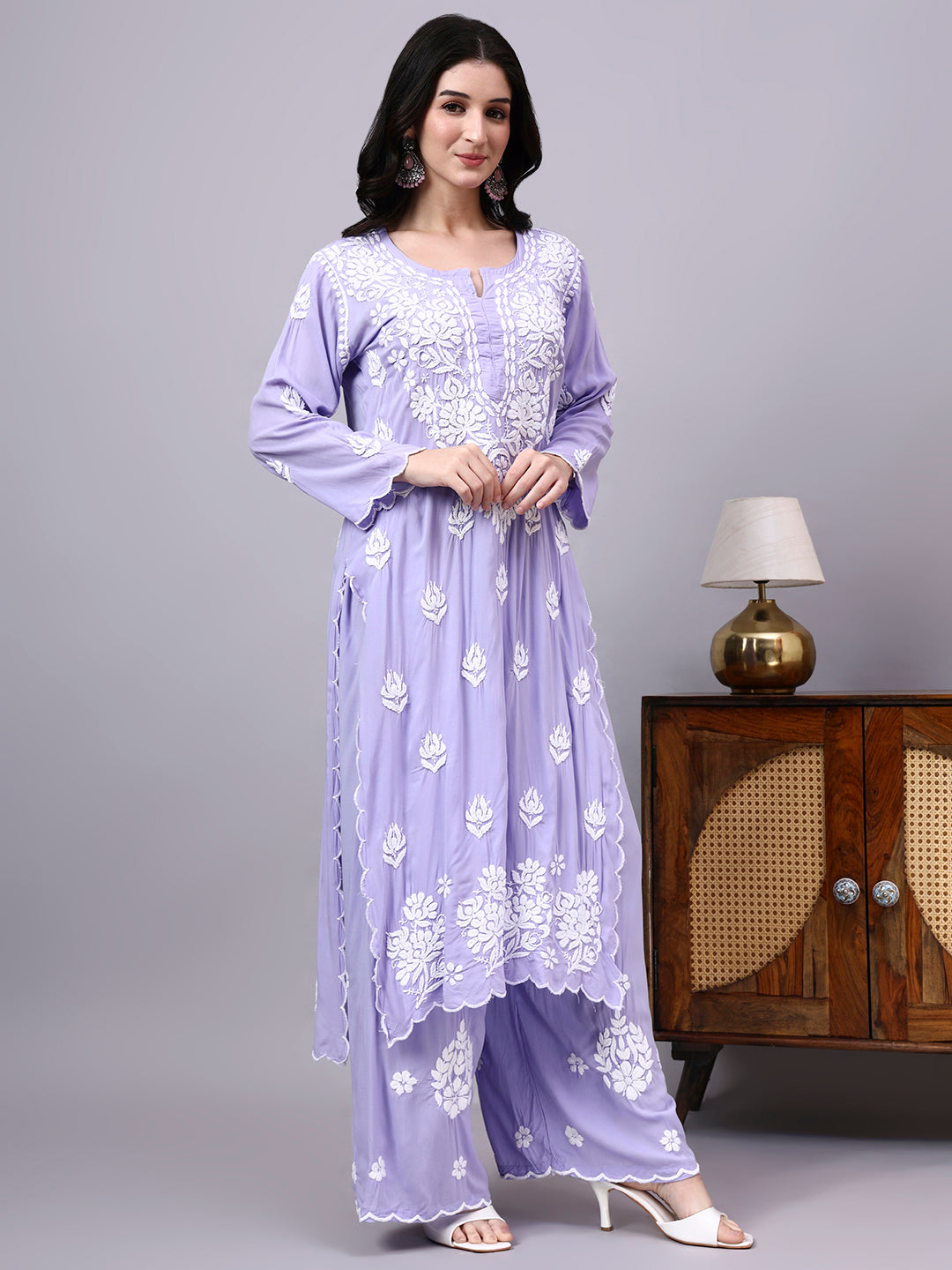 Traditional Chikankari Kurta Set inspired by Lucknow craftsmanship with artisan embroidery, premium fabric quality, and a graceful ethnic appearance.