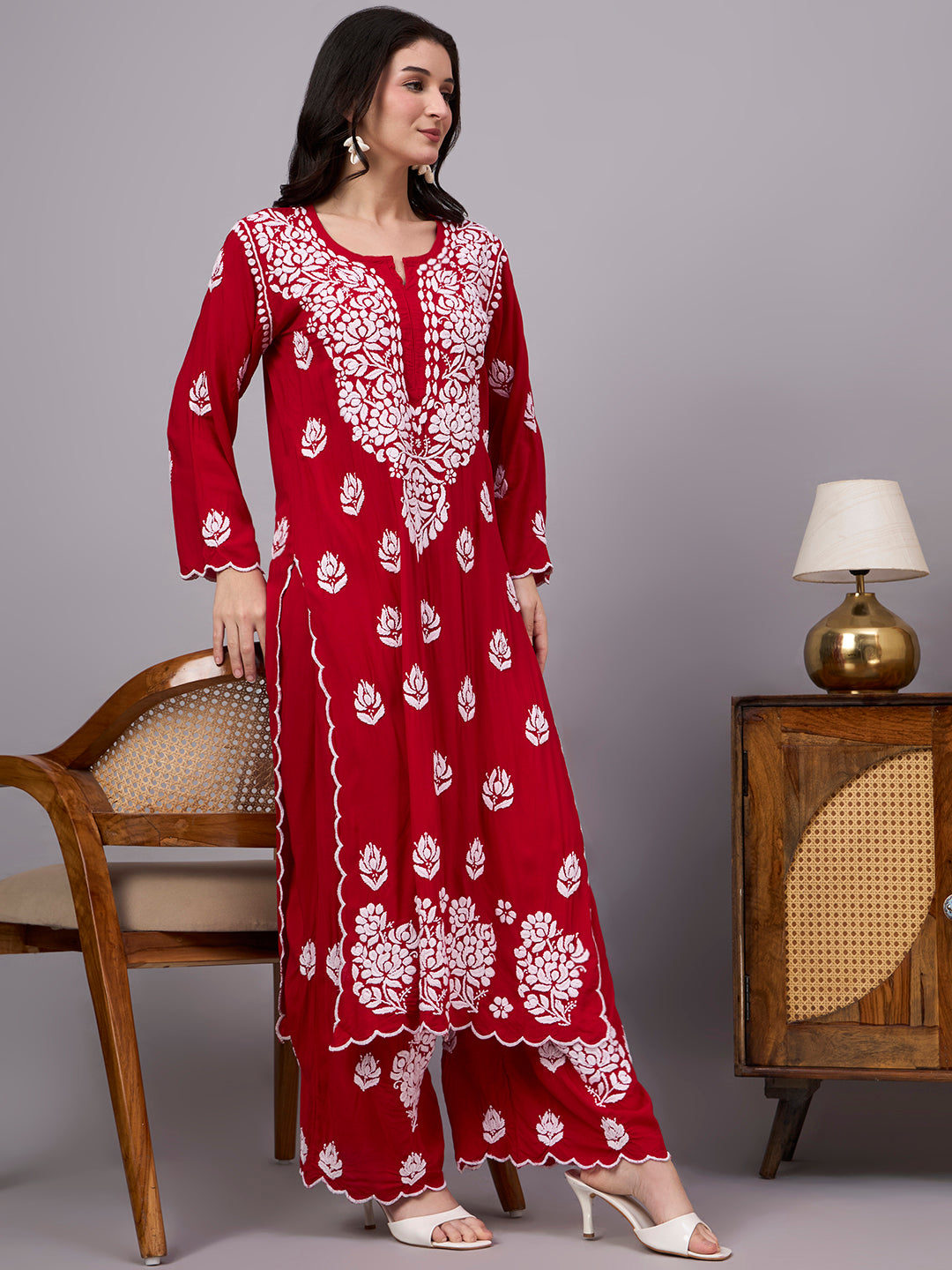 Women's trending Chikankari set showcasing artisan-made embroidery, soft modal construction, and a classic ethnic design suitable for modern wardrobes.