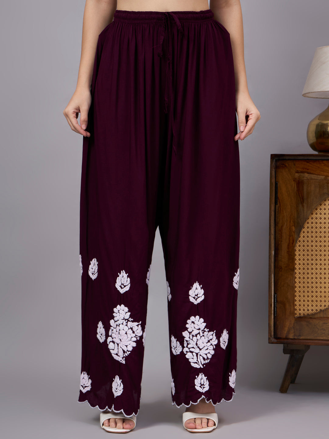 Premium comfortable regular wear set with handcrafted Chikankari embroidery, relaxed silhouette, and matching palazzo designed for everyday ethnic elegance.