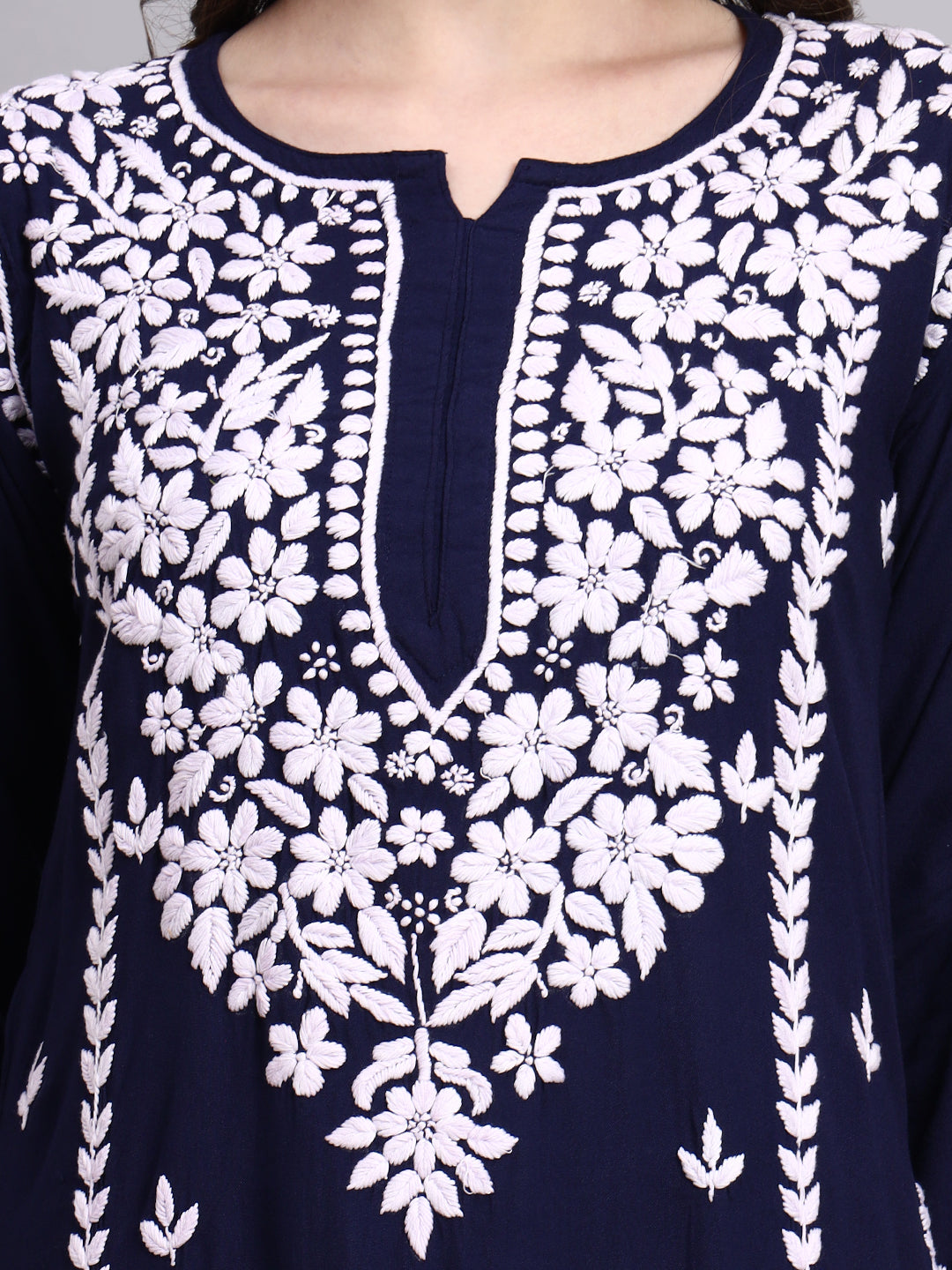 Traditional Indian chikankari embroidered long kurta showcasing straight fit silhouette and delicate handwork by artisans