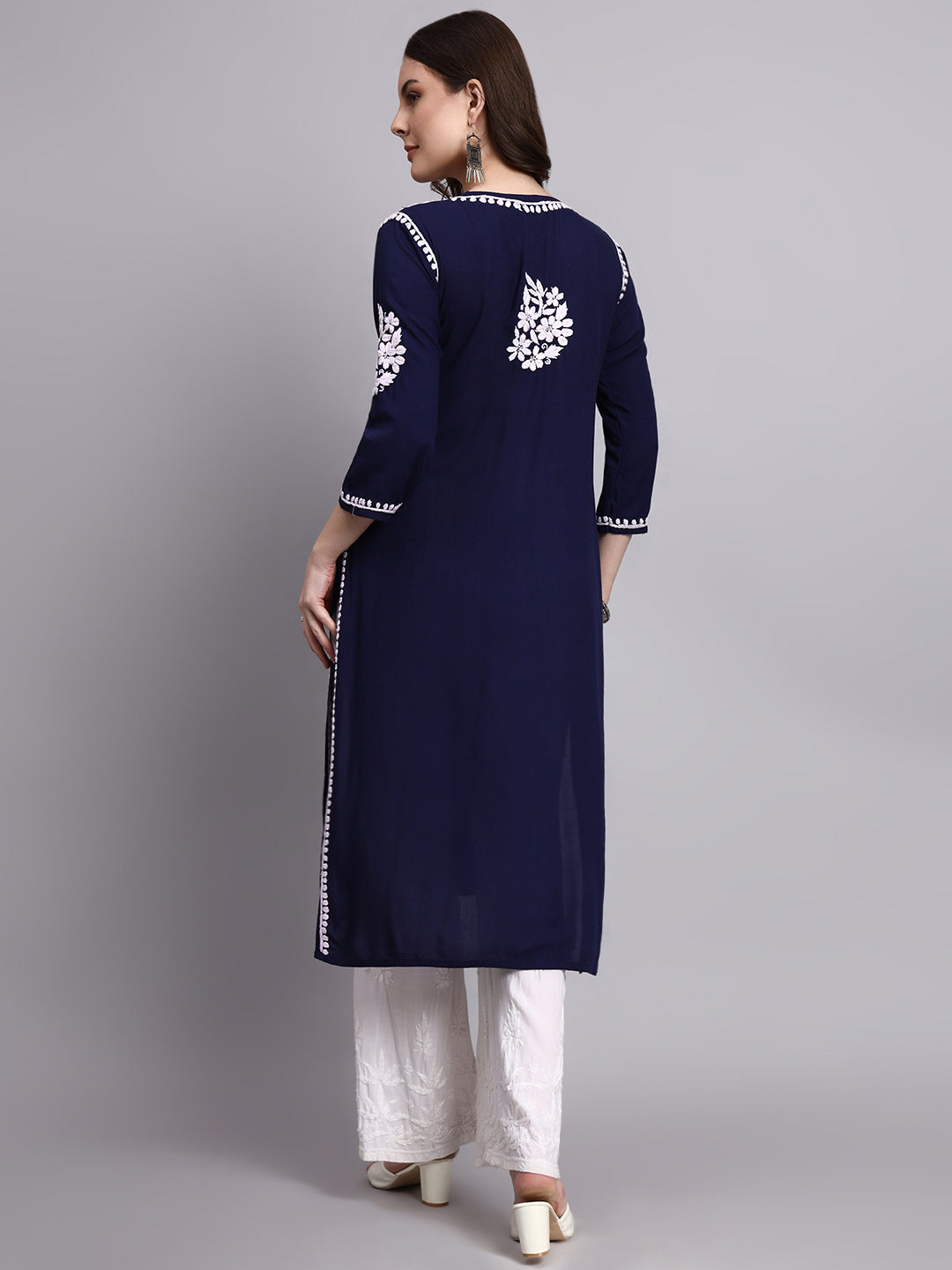 Women’s handcrafted chikankari kurti featuring detailed embroidery on rayon fabric styled with ethnic bottoms