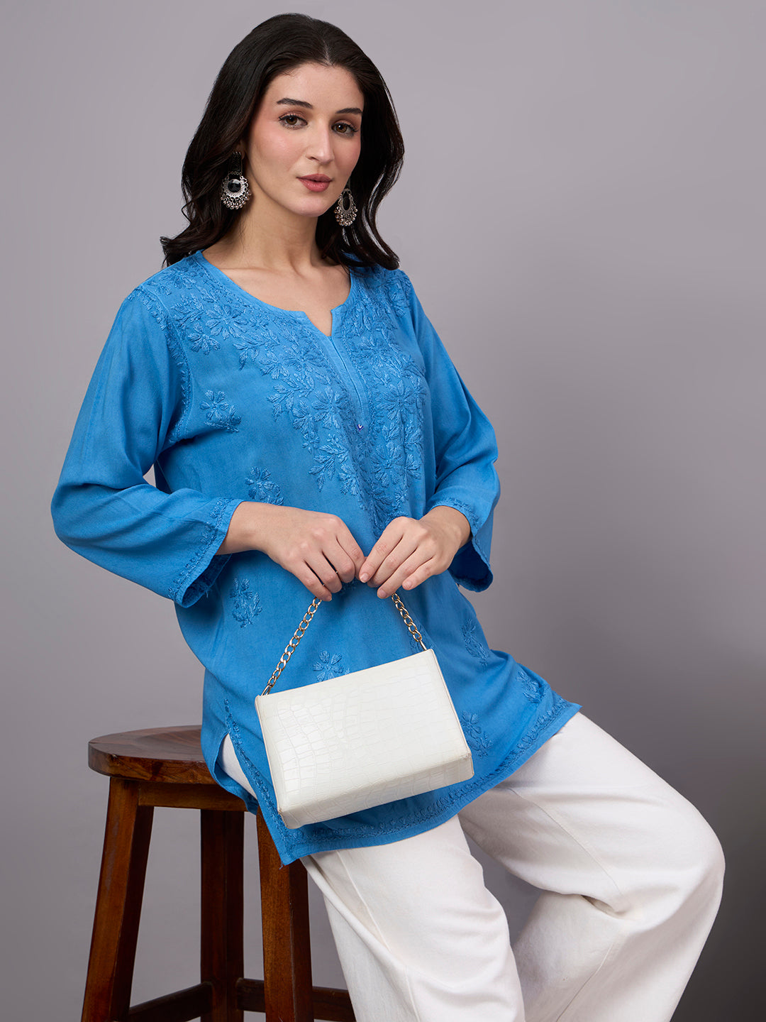 Trending short kurta for women featuring authentic Chikankari embroidery, premium rayon fabric, and contemporary ethnic wear design