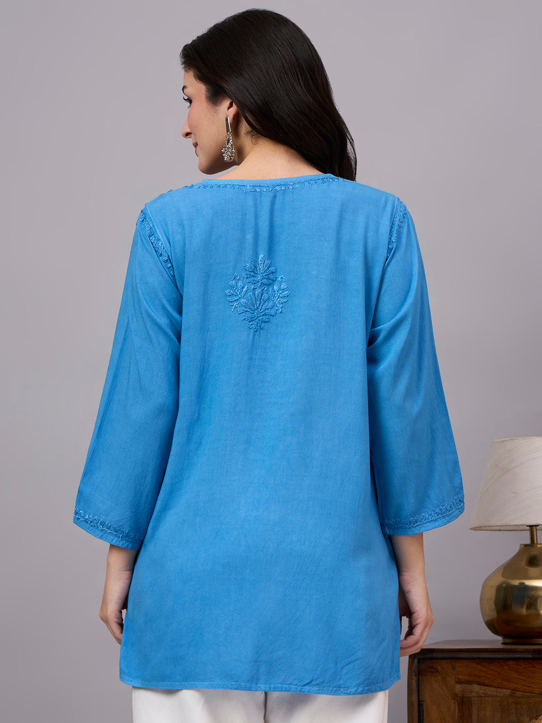 Handcrafted Chikankari short kurta for women made from lightweight rayon fabric with traditional embroidery and stylish casual ethnic appeal
