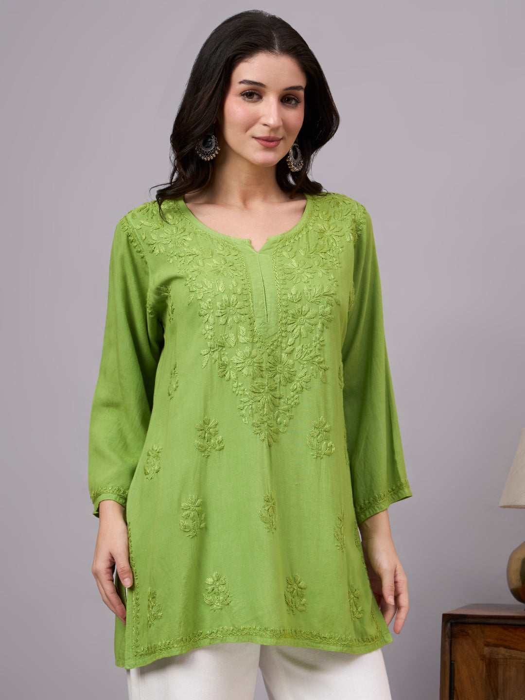 Women’s Chikankari top crafted in soft rayon fabric with beautiful embroidery patterns, perfect for everyday ethnic wardrobe essentials