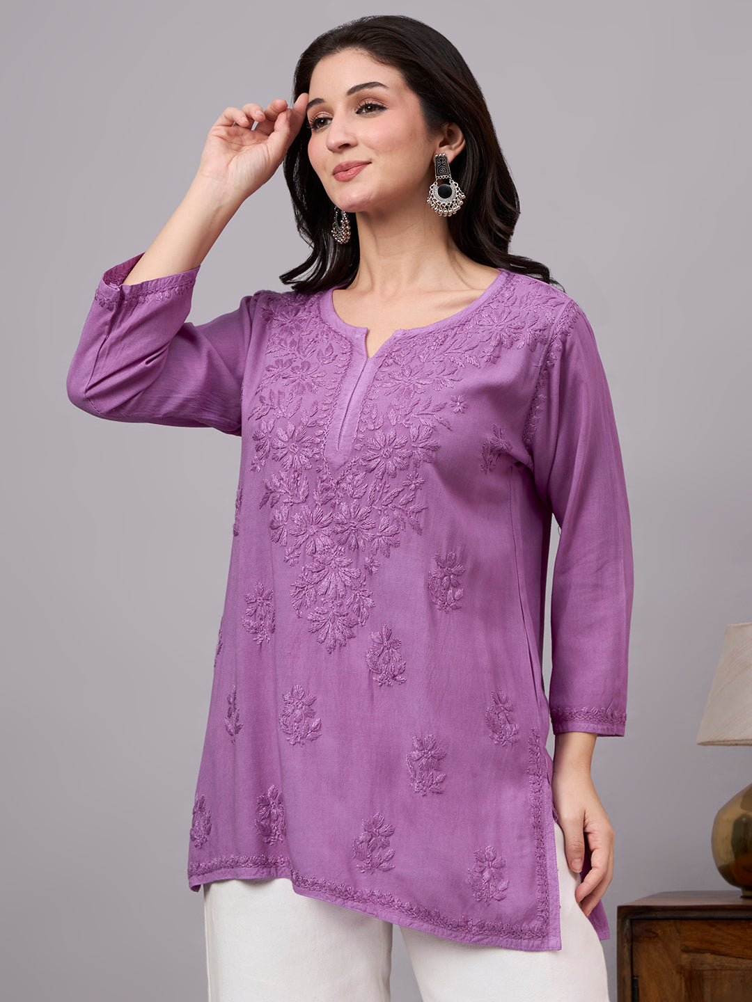 Beautiful women’s ethnic Chikankari top made from premium rayon fabric with detailed threadwork and versatile trending short kurta style for everyday elegance