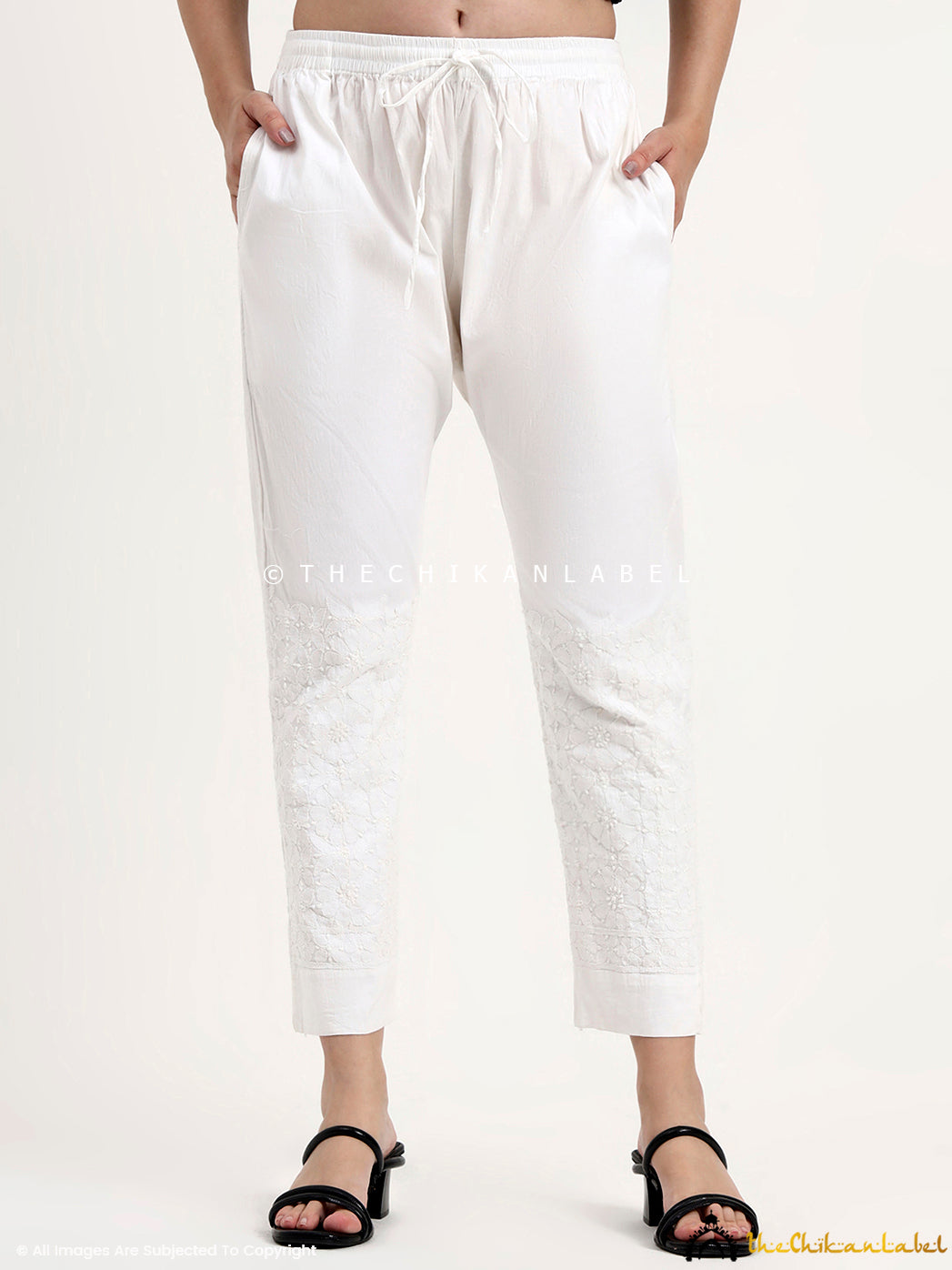 Straight-fit cotton chikankari pant with delicate embroidery for women’s ethnic wear.