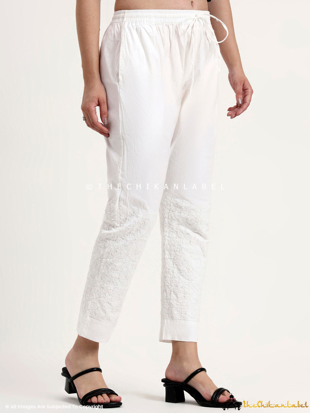 Stylish ethnic bottom wear crafted from breathable cotton with traditional chikankari motifs.