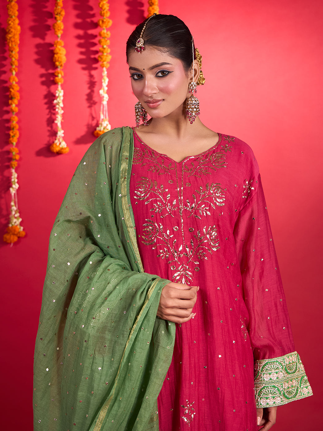 Model styled in the Noorani Mul Chanderi Short Kurti Farshi Set with statement earrings, traditional jewellery and open-toe footwear.