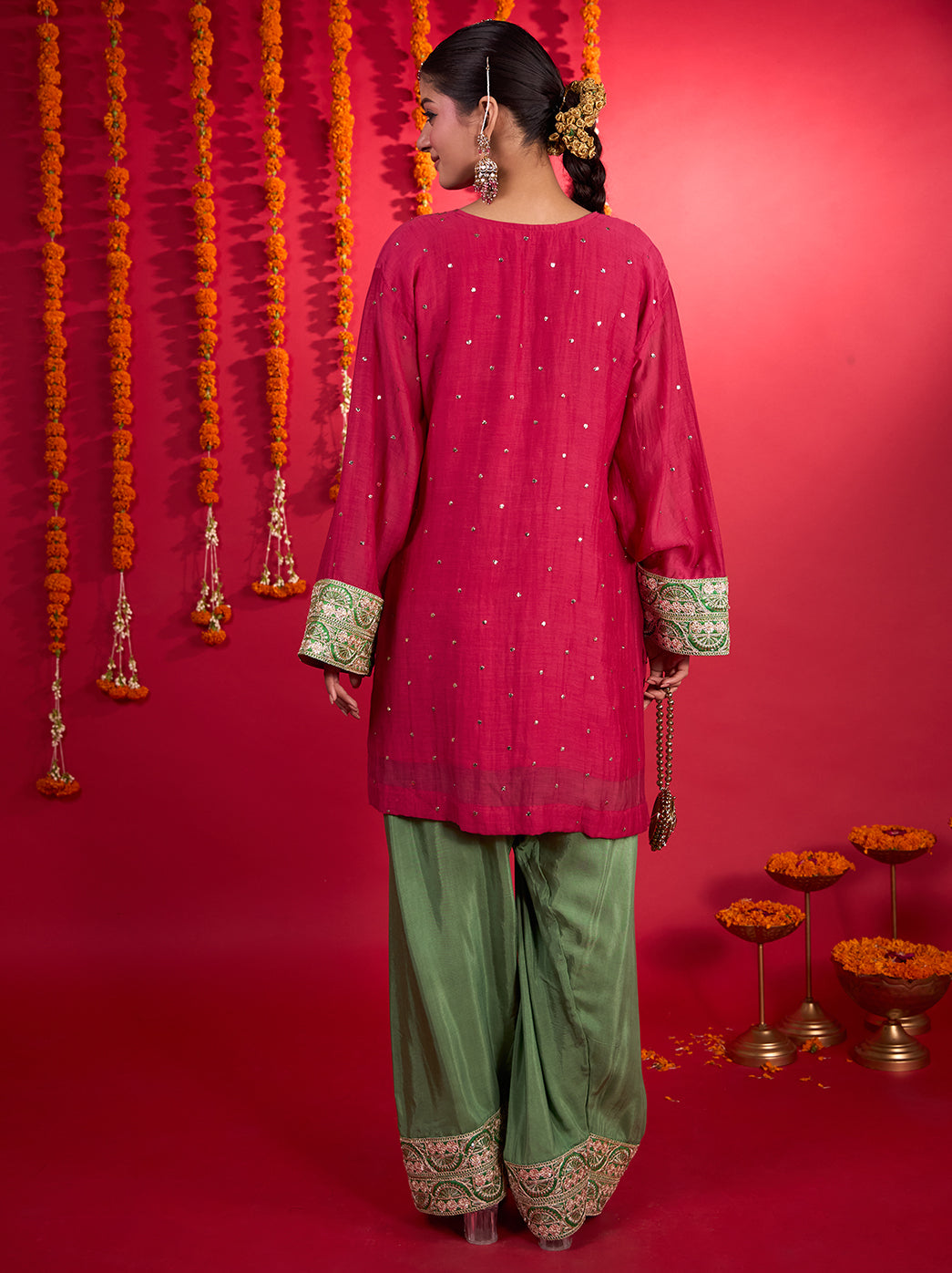 Full-length view of the Noorani Short Kurti Farshi Set showing embroidered sleeve cuffs, embellished pant hems and a dupatta draped over one shoulder.