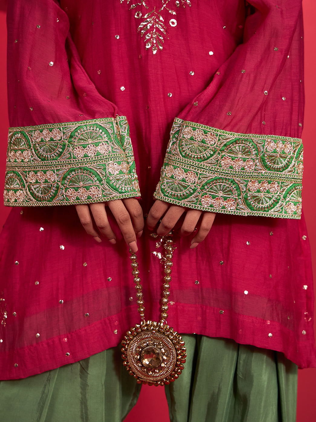 Short Mul Chanderi kurti from the Noorani Farshi Set featuring a rounded neckline with a slit, long sleeves and decorative cuff detailing.