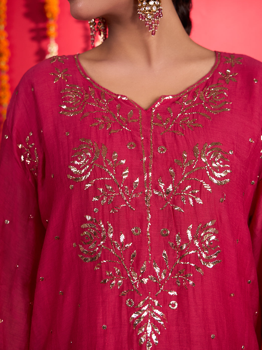 Noorani Mul Chanderi Chikankari kurta set featuring a relaxed short kurti, flowing Farshi pants and a dupatta with decorative border detailing.