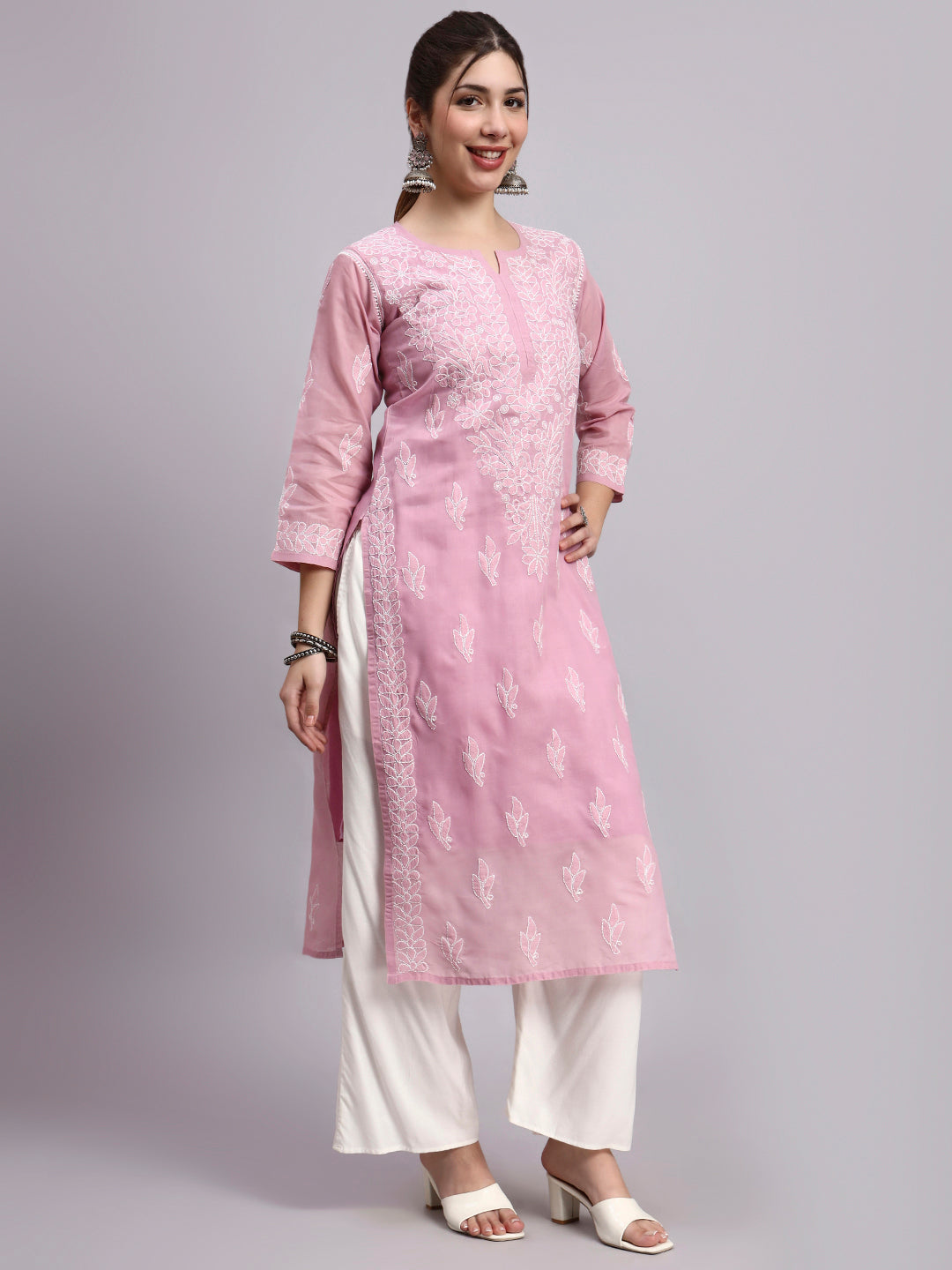 Women ethnic kurta with straight fit silhouette and detailed Chikankari work ideal for modern traditional looks