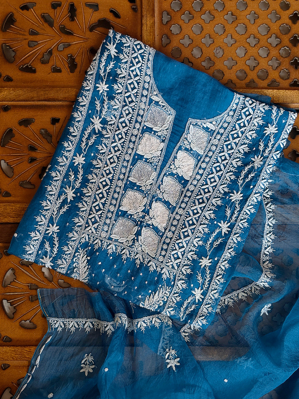 Organza unstitched kurti piece with authentic chikankari embroidery and matching dupatta.