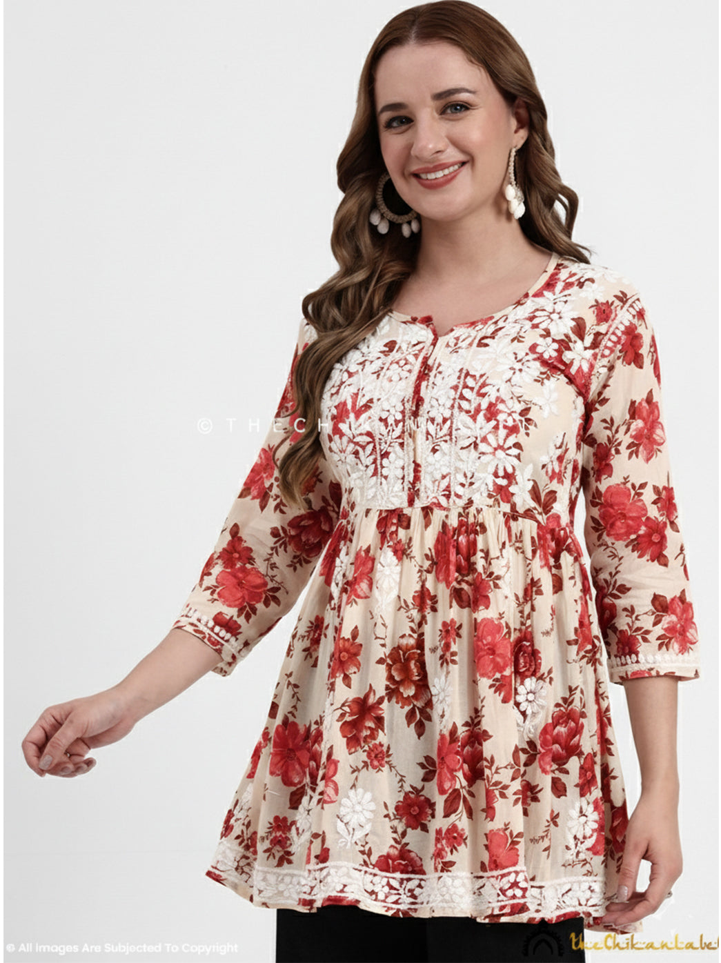 Soft mulmul cotton printed top for women with handcrafted Chikankari accents, perfect for summer and daily comfort.