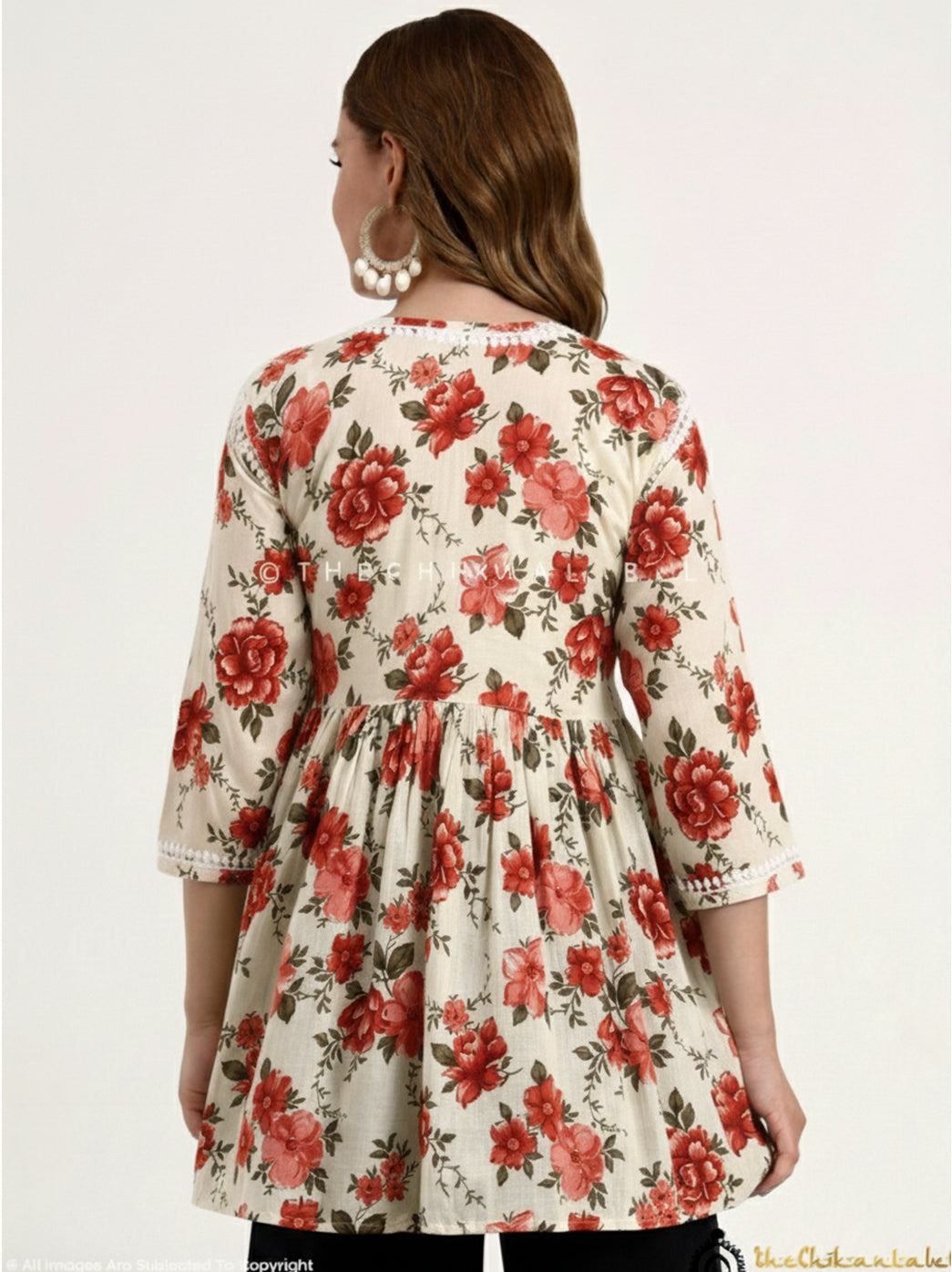 Artisan-crafted Mulmul Cotton Chikankari Short Top with premium printed fabric and flowy, relaxed silhouette for casual styling.