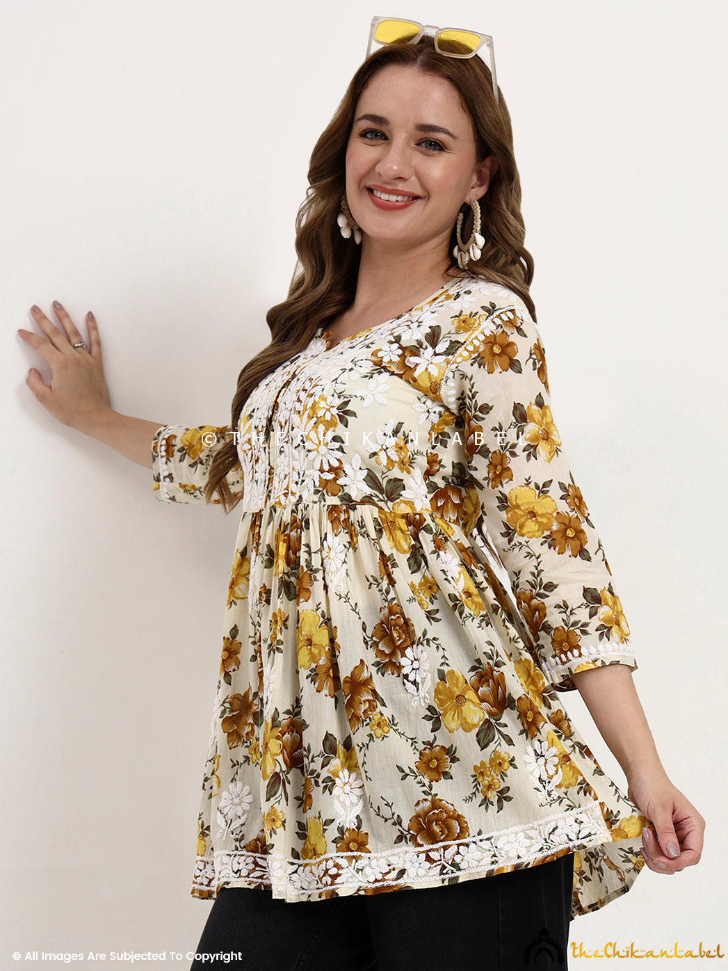 Soft mulmul cotton printed top for women with handcrafted Chikankari accents, perfect for summer and daily comfort.