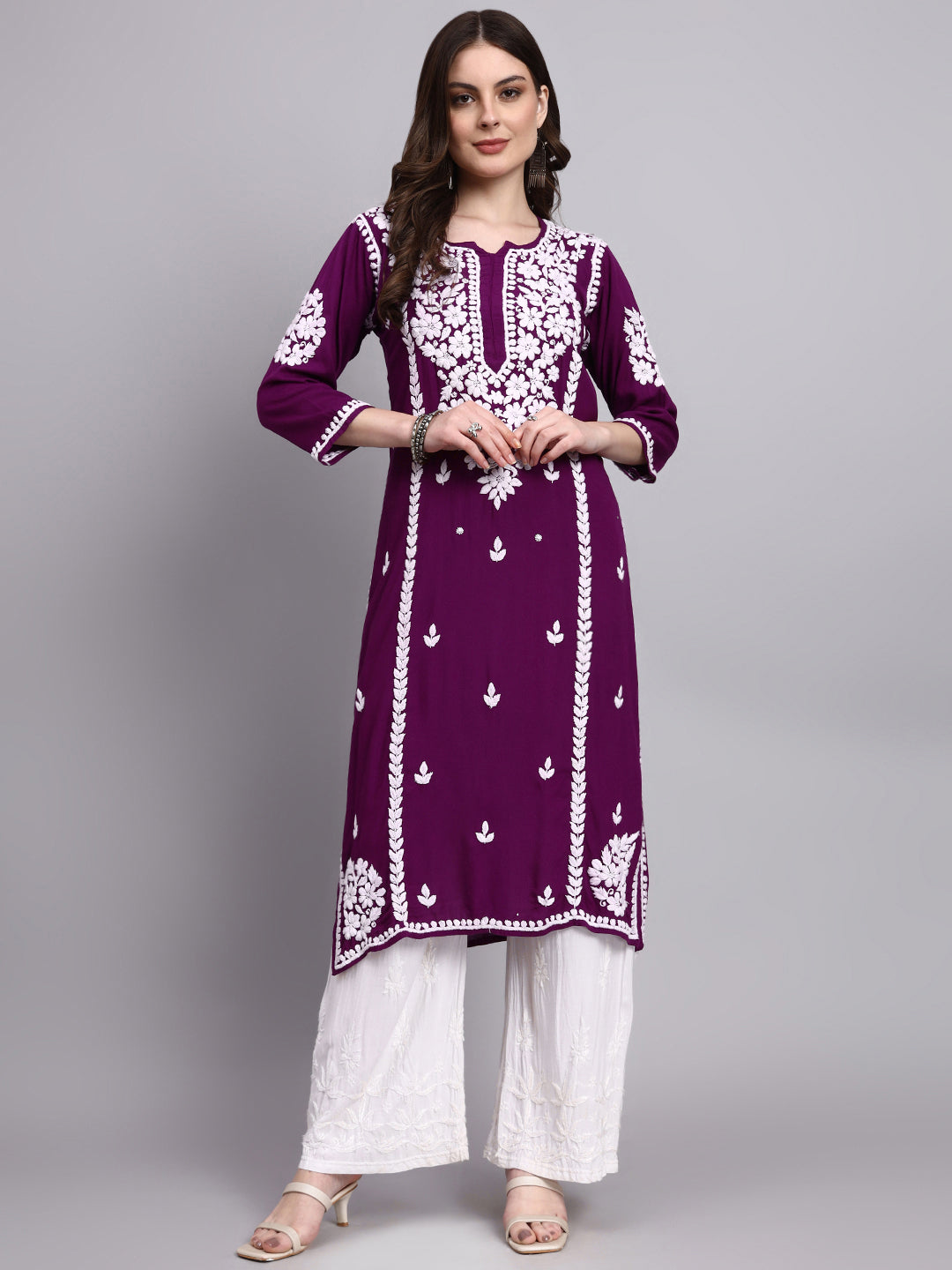 Elegant women’s rayon chikankari long kurta showcasing artisan hand embroidery on neckline sleeves and hemline