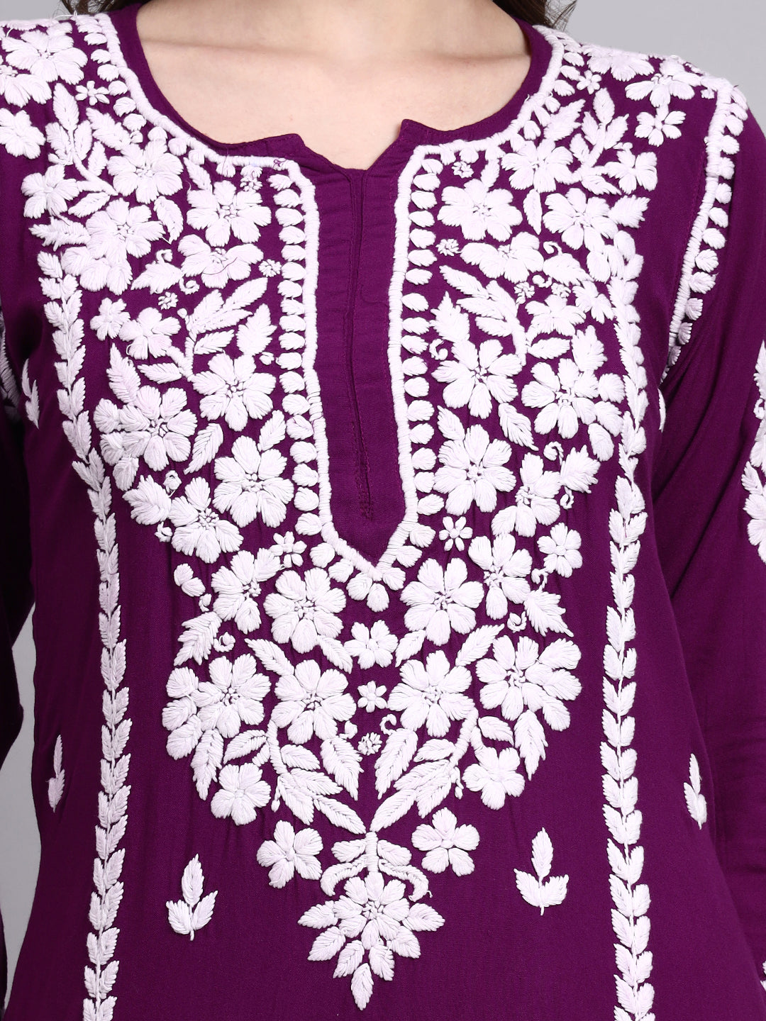 Straight fit chikankari long kurta for women designed with lightweight rayon fabric and intricate handcrafted floral motifs